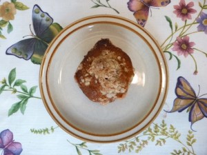 A summer berry muffin ready to eat.